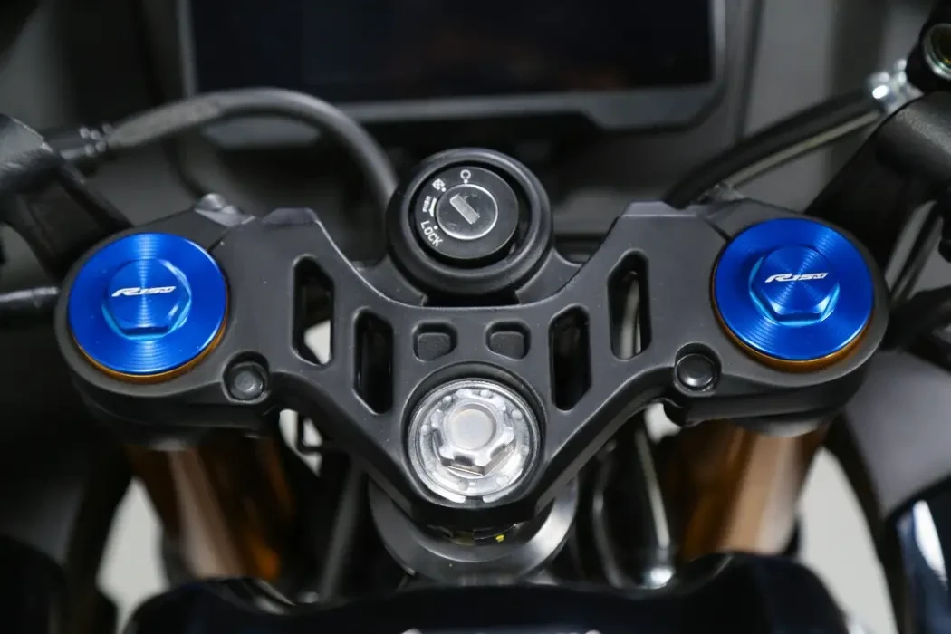 Detail image of Yamaha YZF-R15M in Icon Performance Colourway, ignition and forks