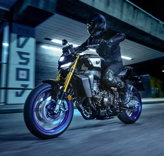 Action image of Yamaha MT 09 SP in Icon Colourway, Front three quarter tracking shot