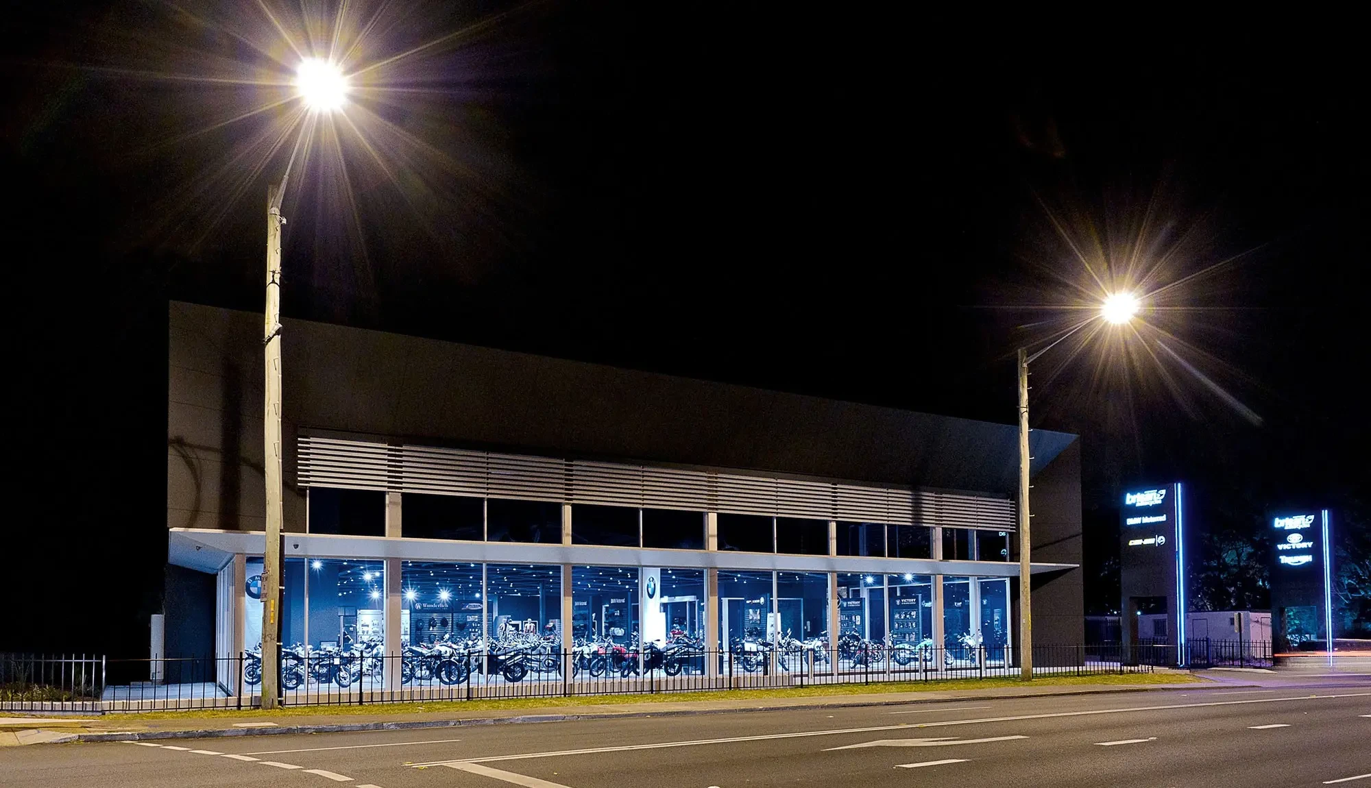 Brisan Motorcycles Newcastle dealership at night