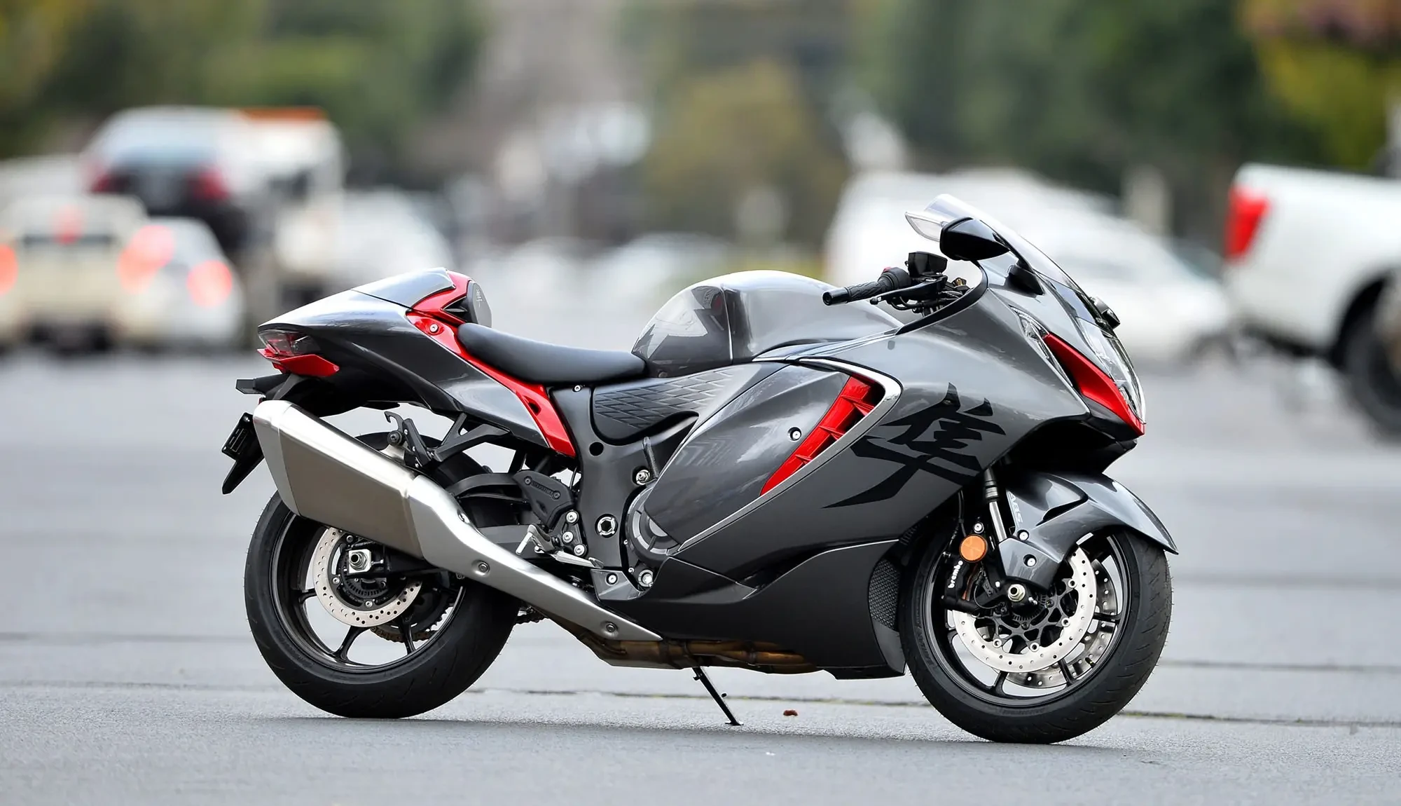 side on image of a Suzuki Hayabusa 2023 - taken outside in cityscape surrounding