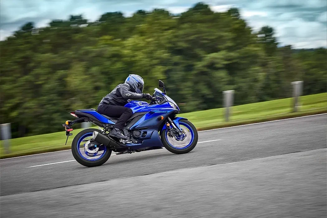 Action image of Yamaha YZF-R3 LAMS in blue colourway, side on left