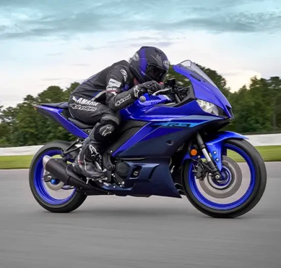 Action image of Yamaha YZF-R3 LAMS in blue colourway, front three quarter right side